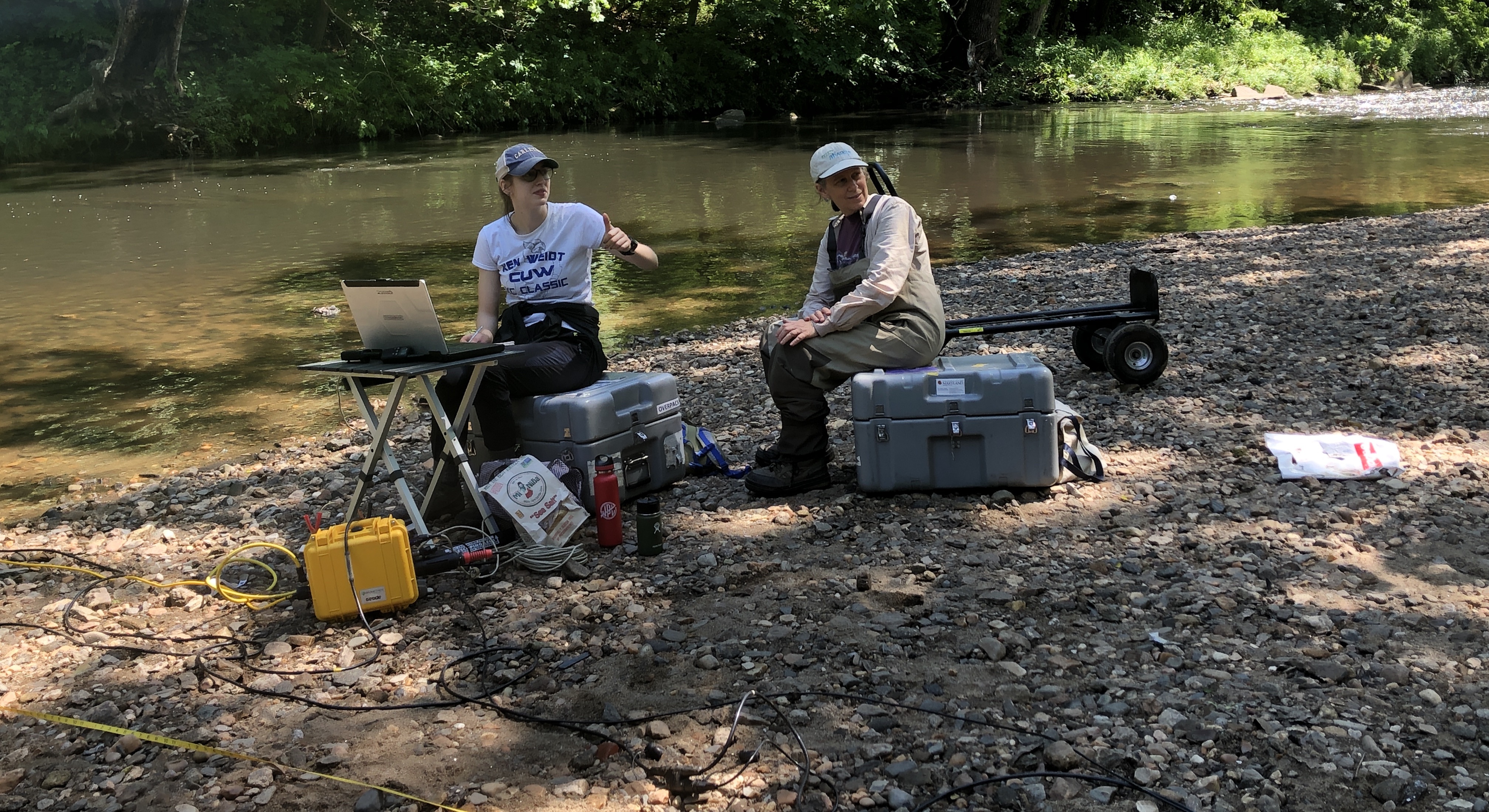 Berit Hudson-Rasmussen and Laura Toran participating in seismic survey of Pennypack Creek.
